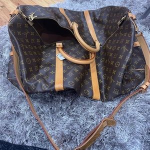 60” authentic Louis Vuitton Luggage